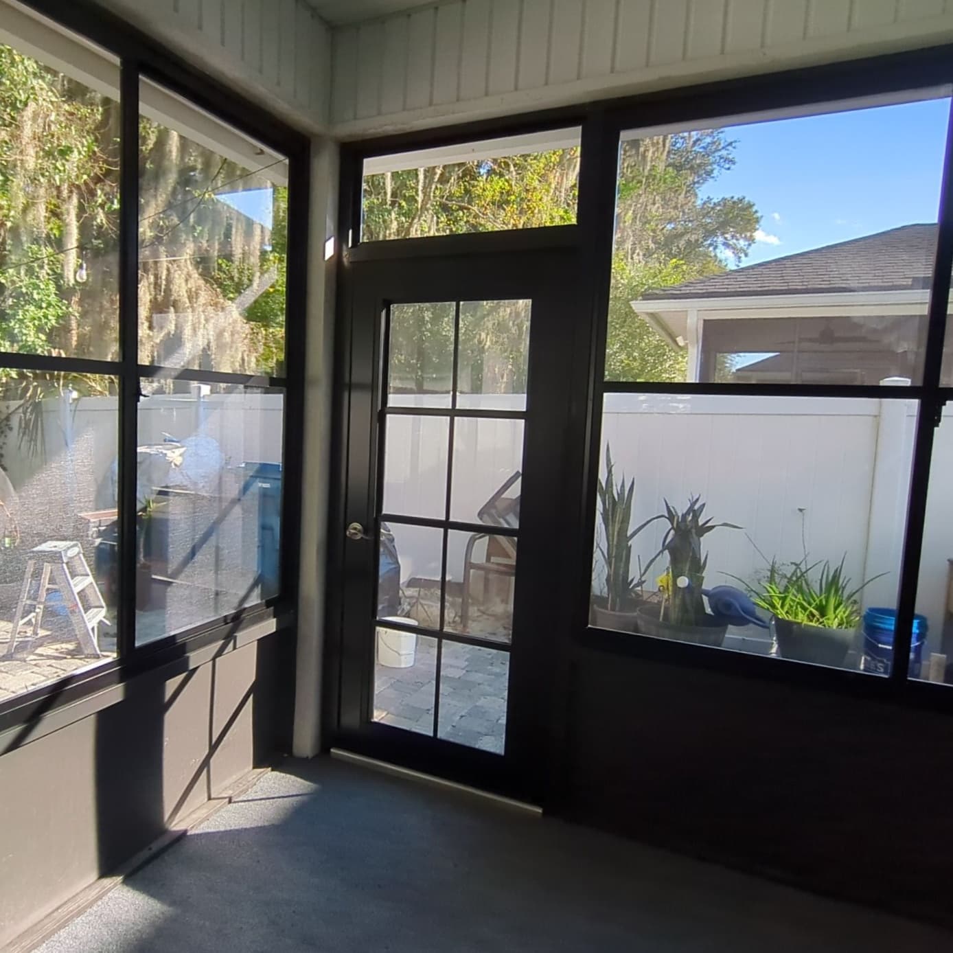 Enclosed porch with Sunspace WeatherMaster vinyl windows installed by NKO Sunrooms in Jacksonville